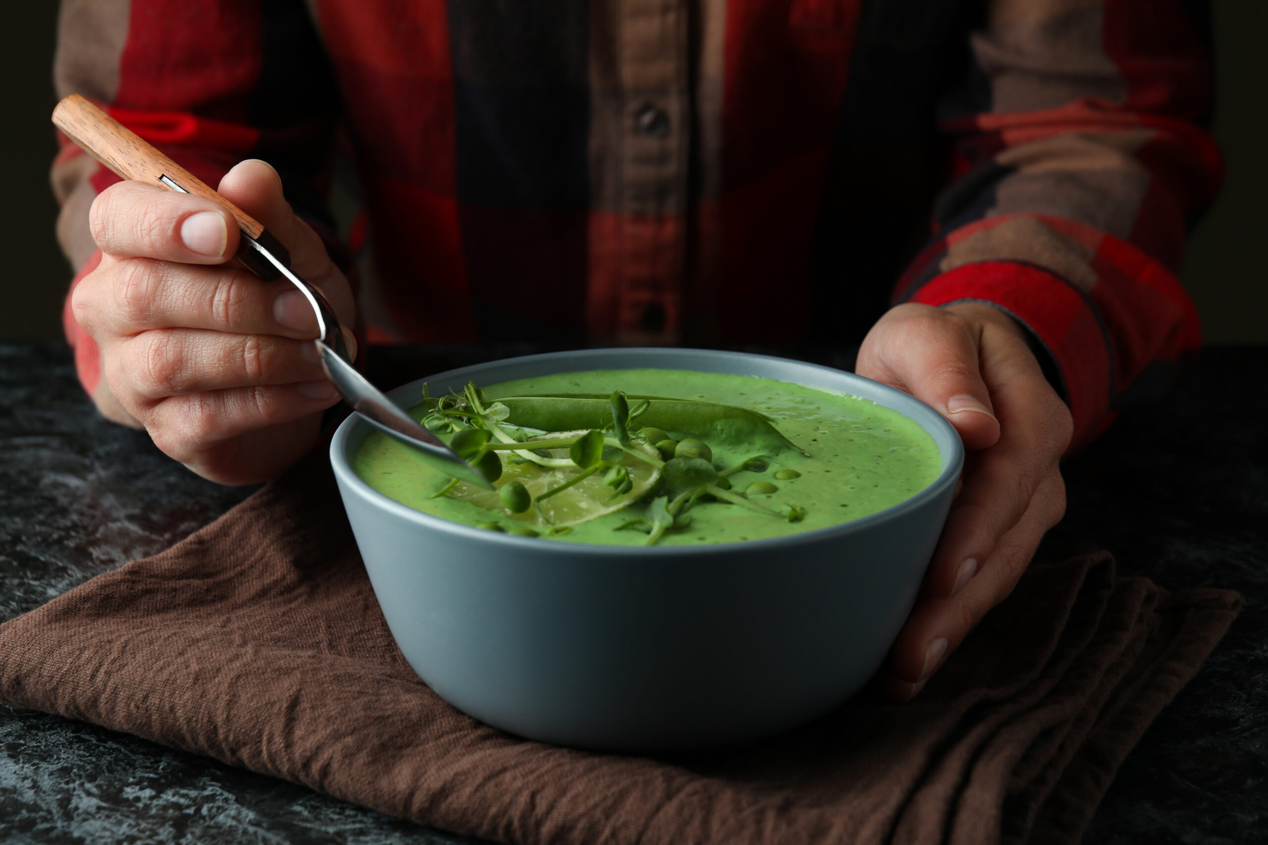 Concept of tasty eating with pea soup